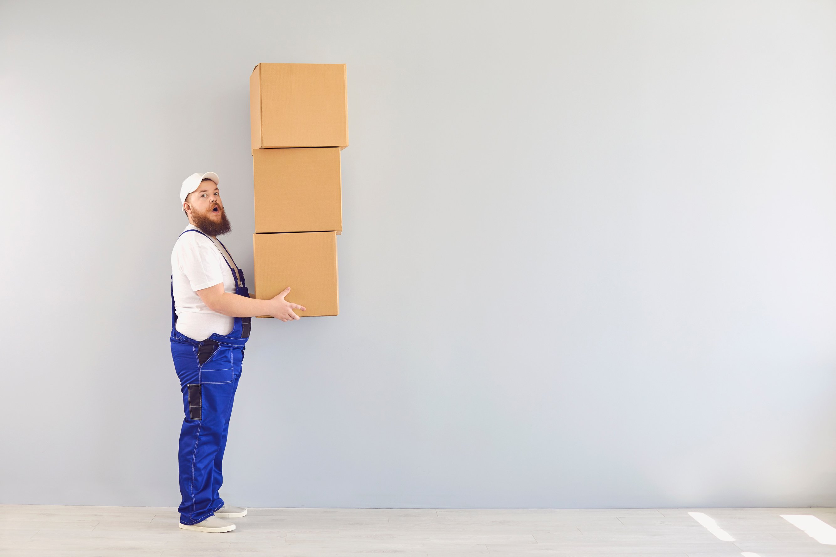 Content Delivery Man with Pile of Boxes